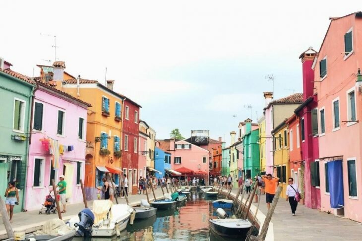 Colourful houses around channel in Venice