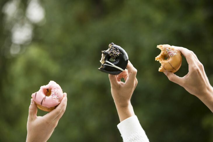 Donuts raised in the air